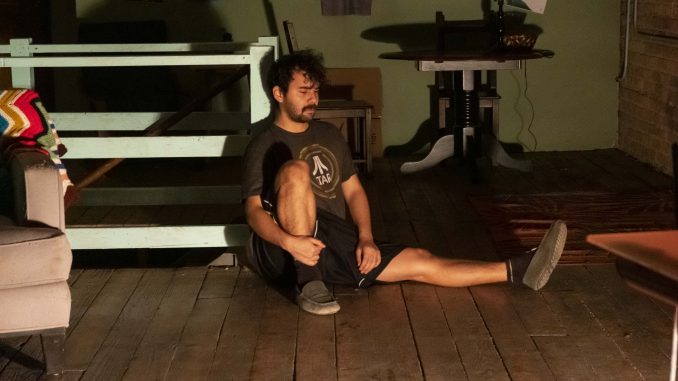SP 2 A man sitting